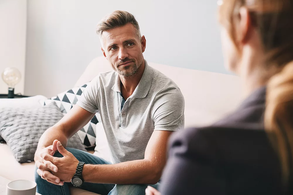 person talking to therapist